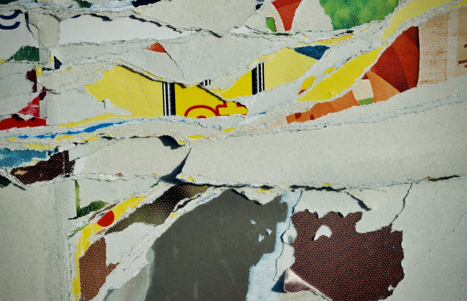 Contemporary abstract art depicting a collage of torn colorful paper layers for creative inspiration.